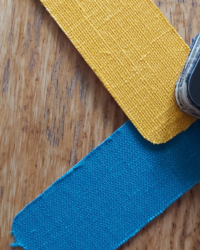 Mustard yellow and turquois colour swatches